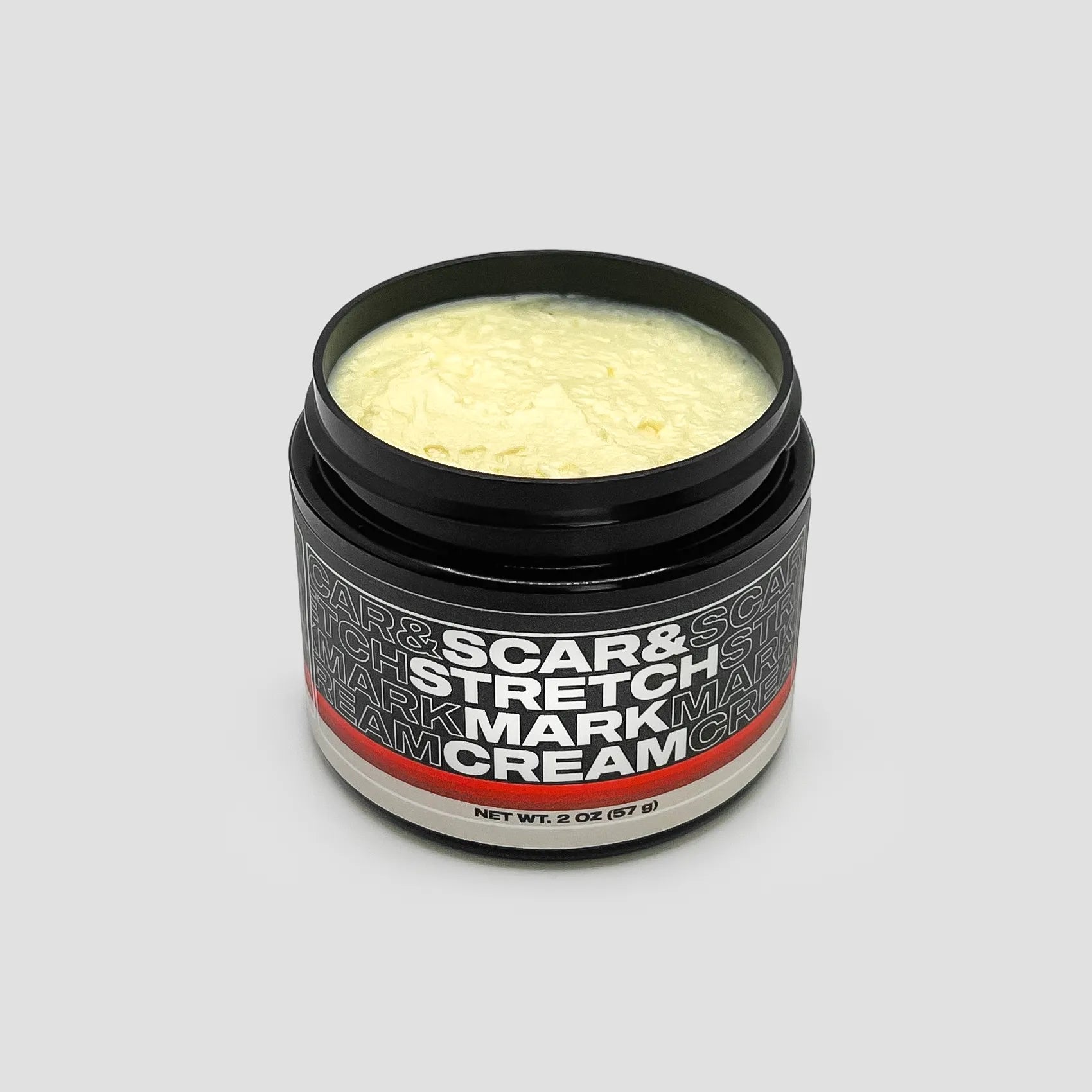 Men's Stretch Mark Cream by Tapered, Open Jar