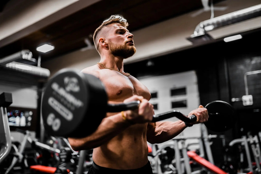 man in the gym, lifting weights