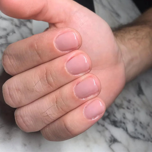 man with manicure, clear coat nail polish